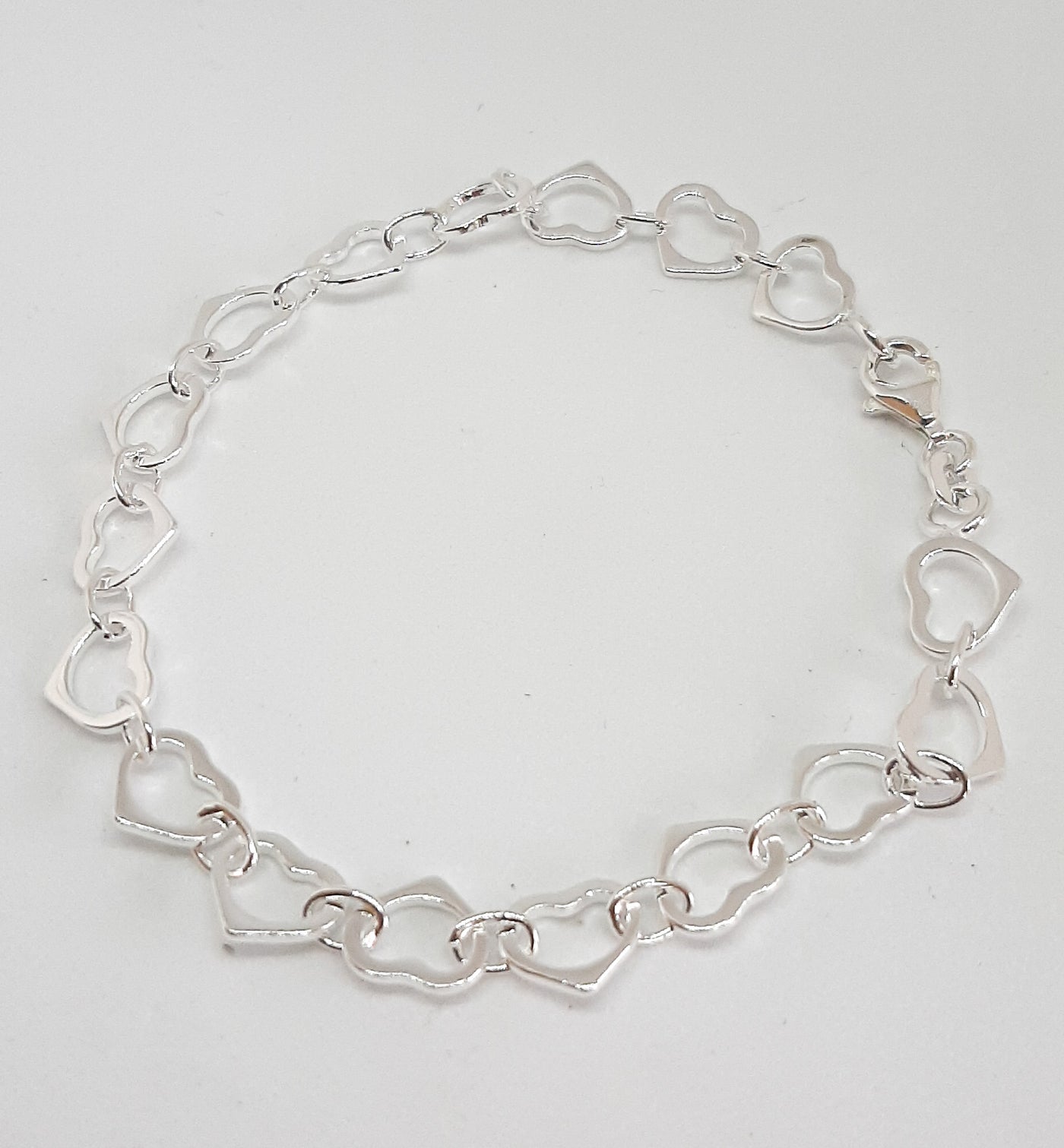 Heavy Silver Linked Hearts Bracelet