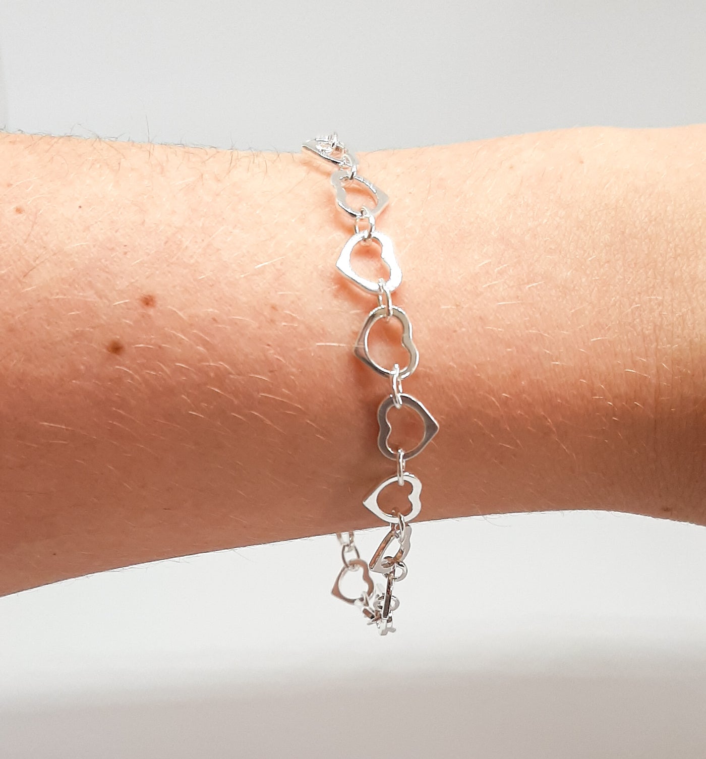 Heavy Silver Linked Hearts Bracelet