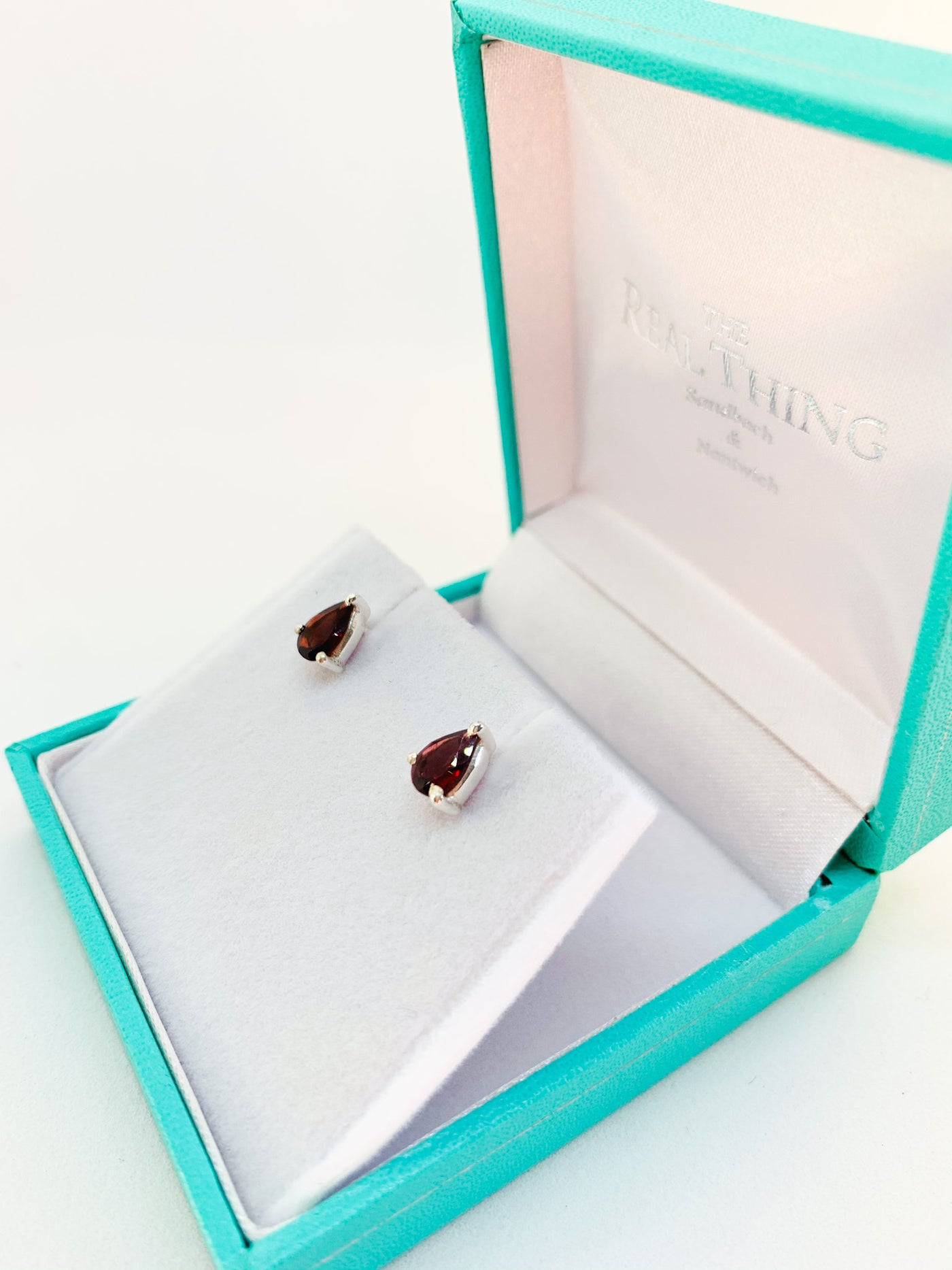 Teardrop Garnet Claw Set Stud Earrings