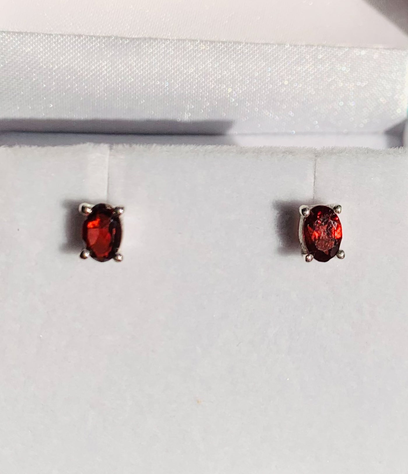 Oval Garnet Claw Set Stud Earrings