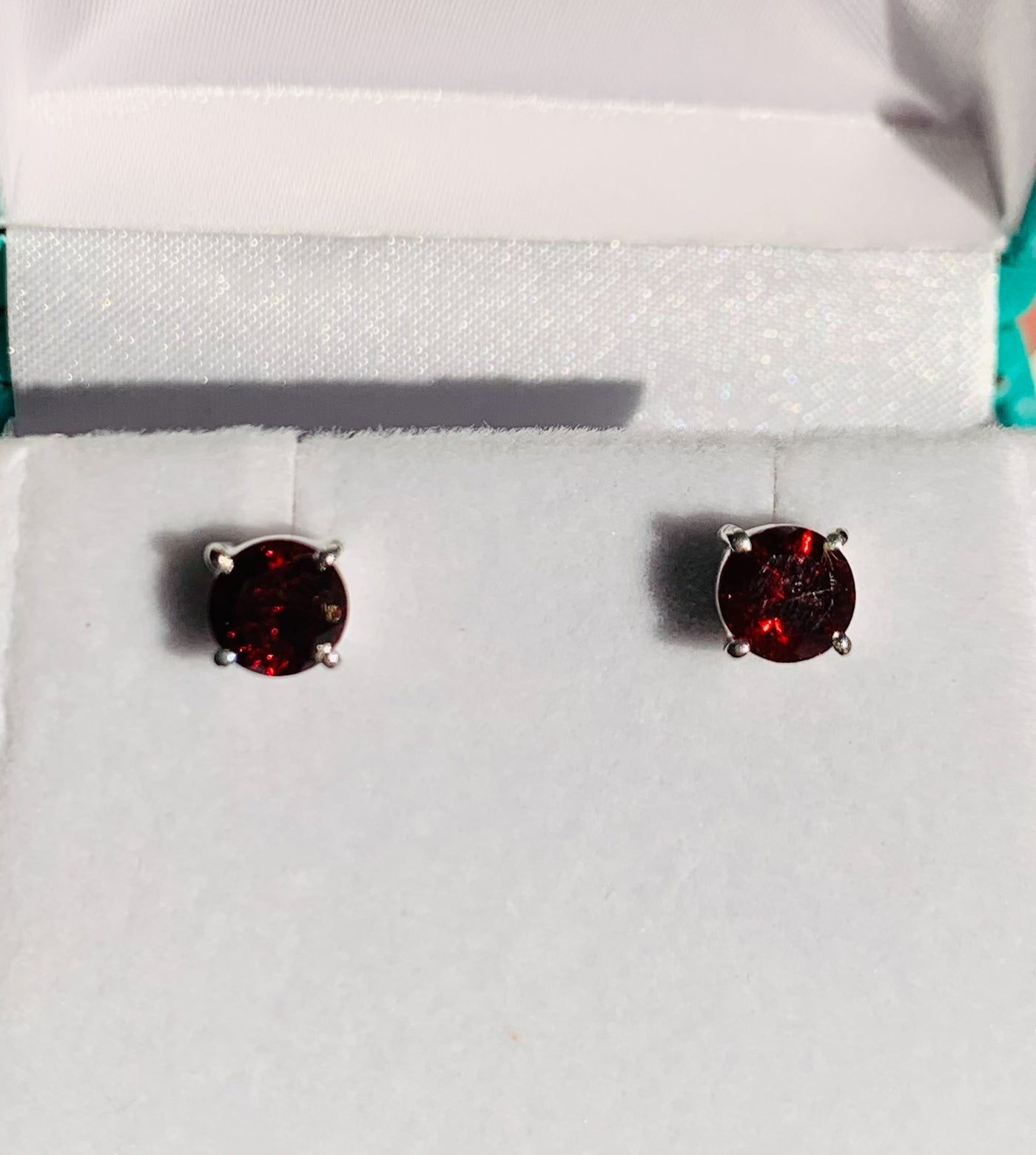 Round Garnet Claw Set Stud Earrings