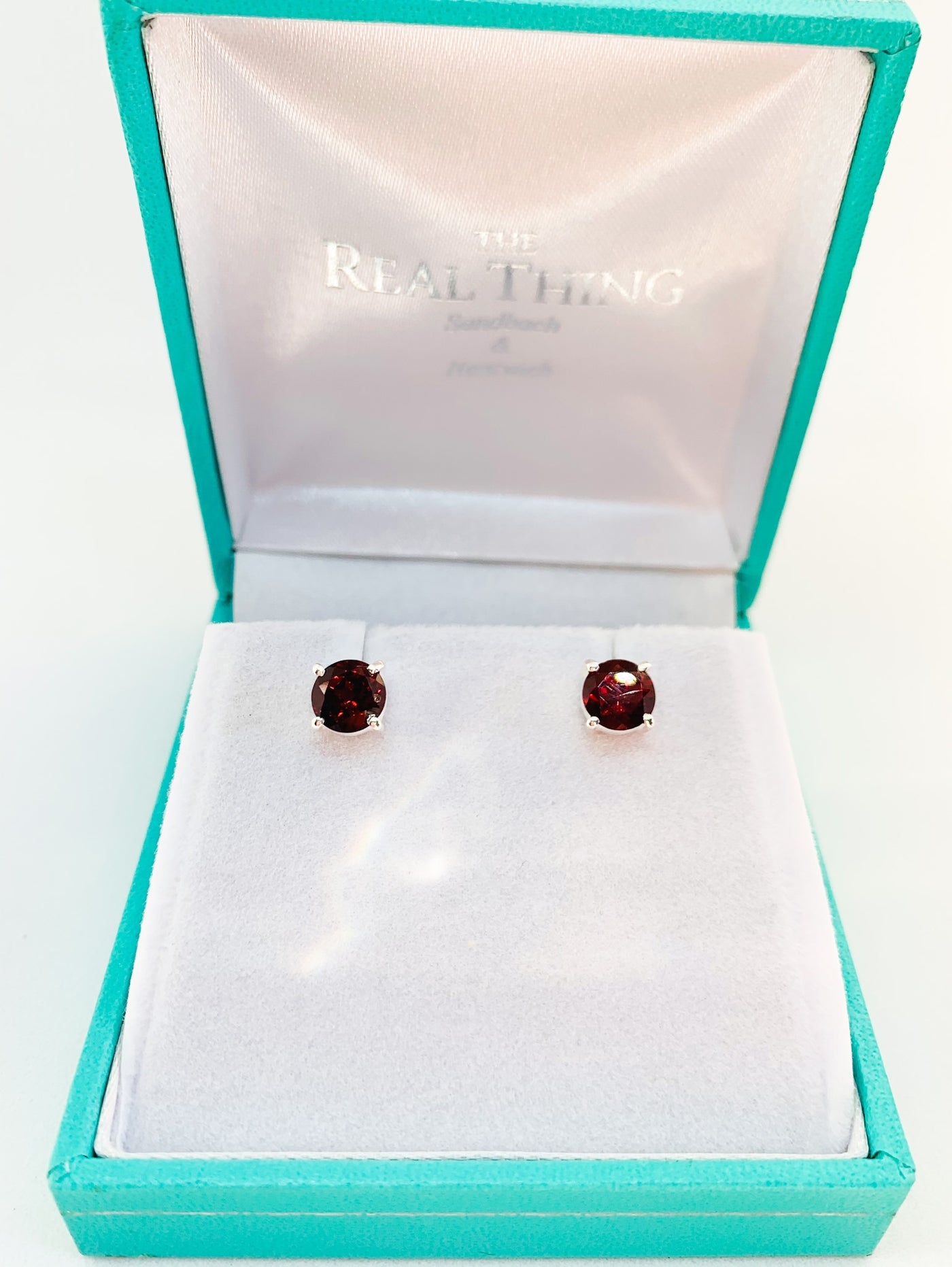 Round Garnet Claw Set Stud Earrings