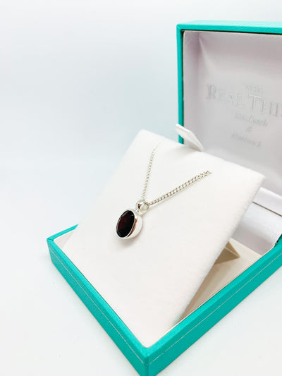 Heavy Oval Shaped Garnet Pendant