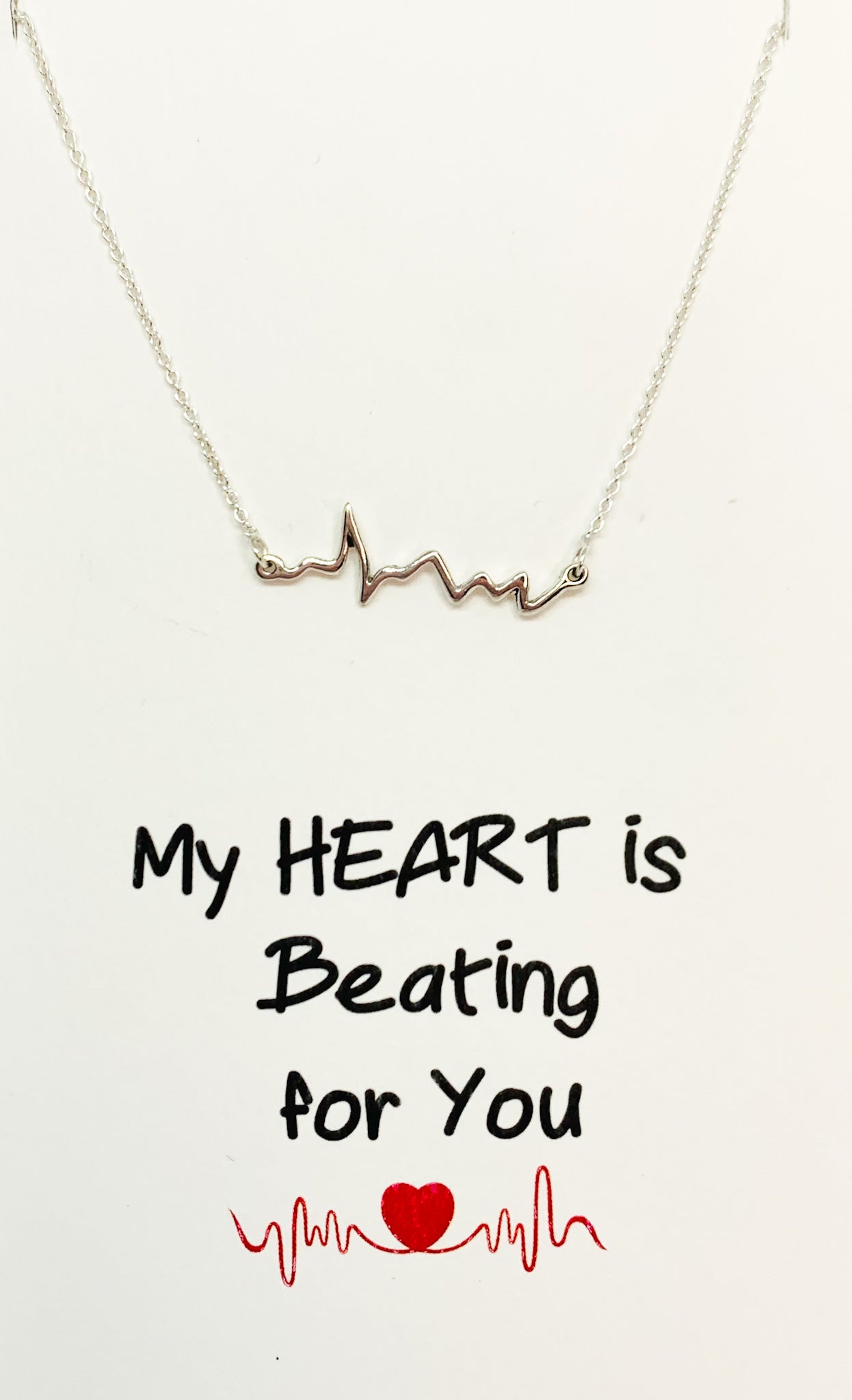 silver heart beat necklace